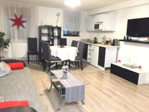 Kuchyň nebo kuchyňský kout v ubytování Piknik Apartmant