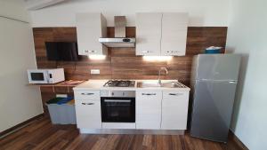 Dapur atau dapur kecil di DOMU NOSTA di Giulio & Ignazia Dèpendance +9 gambar