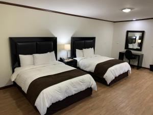 Postel nebo postele na pokoji v ubytování Hotel Los Arcos + 20 fotografií
