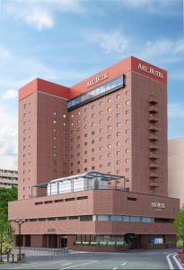 盛岡市にあるアートホテル盛岡の大きな建物の上にエアホテルがあります。