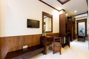 TV a/nebo společenská místnost v ubytování De Munut Balinese Resort