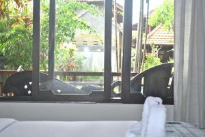 Ein Balkon oder eine Terrasse in der Unterkunft Rumah Roda