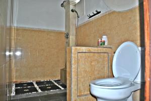 Ein Badezimmer in der Unterkunft Rumah Roda
