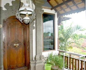 Ein Balkon oder eine Terrasse in der Unterkunft Rumah Roda