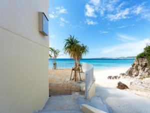 a view of the beach from a building at Churaumi on the Beach Motobu in Motobu