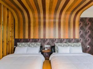 سرير أو أسرّة في غرفة في Bethlehem B&B