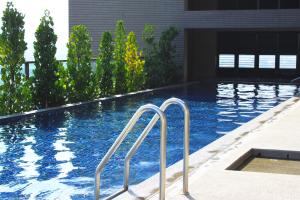 Swimmingpoolen hos eller tæt på Golden Tulip Zhong Xin Hotel Taichung