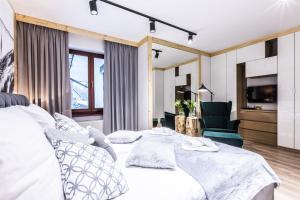 Posteľ alebo postele v izbe v ubytovaní Apartament SKI + 7 fotografií