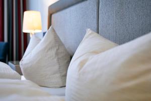 Postel nebo postele na pokoji v ubytování WILLINO Privathotel