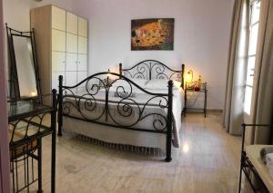 A bed or beds in a room at Villa Amaryllis