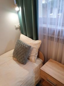 Postel nebo postele na pokoji v ubytování Hostel Mleczna - Metro Zacisze