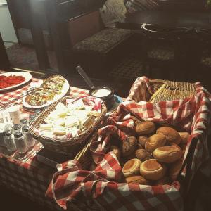 a table topped with lots of different types of food at Den Röda Båten in Stockholm