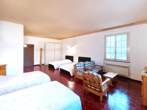 A bed or beds in a room at VILLA MOLINELLA