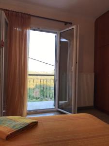 Posteľ alebo postele v izbe v ubytovaní Schönes Familienappartement in Pelekas, Corfu mit Meerblick