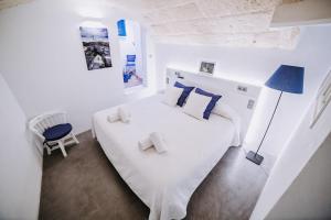 Postel nebo postele na pokoji v ubytování Petit Hotel 5 Fars