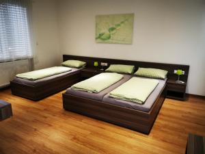 Ein Bett oder Betten in einem Zimmer der Unterkunft Eazy Hostel Heidelberg