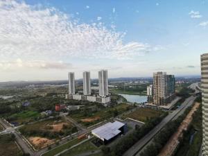 an aerial view of a city with tall buildings at Ezzyhome@Medini in Nusajaya