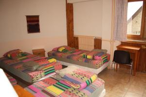 Postel nebo postele na pokoji v ubytování LE GÎTE LES MELEZES