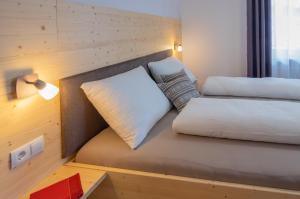 Postel nebo postele na pokoji v ubytování B&B Frühlingsheim