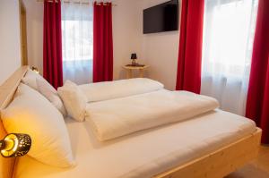 Postel nebo postele na pokoji v ubytování B&B Frühlingsheim