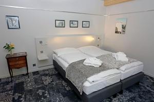 Letto o letti in una camera di Fleur de Lis