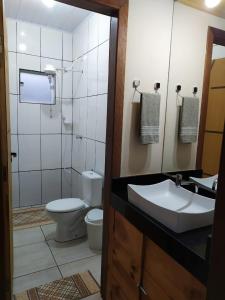 Koupelna v ubytování casa temporada capitólio