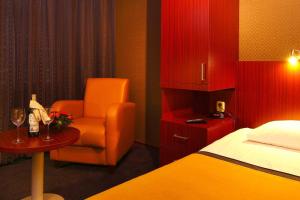 Postel nebo postele na pokoji v ubytování Hotel Parkzicht