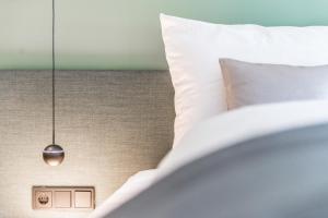 Posteľ alebo postele v izbe v ubytovaní Lifestylehotel dasMAX