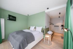 Posteľ alebo postele v izbe v ubytovaní Lifestylehotel dasMAX