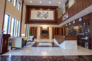 a lobby with a reception desk in a building at Seasons Park- mawasim al hay at hotel in Jeddah