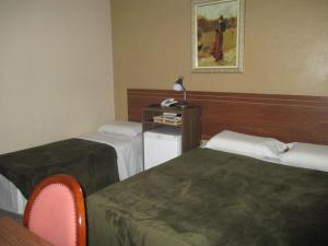 Cama o camas de una habitación en Victor Plaza Formiga