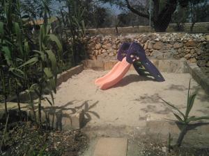 Ein Garten an der Unterkunft SWEET HOUSE