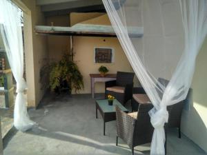 Ein Sitzbereich in der Unterkunft SWEET HOUSE