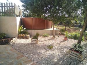 Ein Garten an der Unterkunft SWEET HOUSE