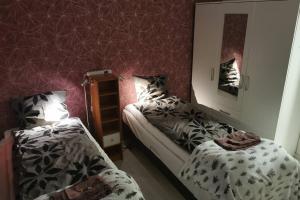 Ένα ή περισσότερα κρεβάτια σε δωμάτιο στο Villa Arctic Passion