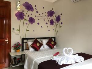 Giường trong phòng chung tại Thăng Loan Tam Cốc Hostel