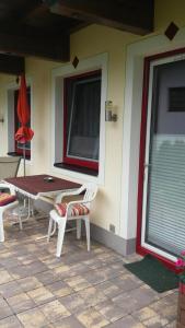 Patio alebo iná vonkajšia časť ubytovania Ferienwohnung Kogler