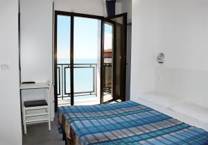 Postel nebo postele na pokoji v ubytování Hotel Ondina