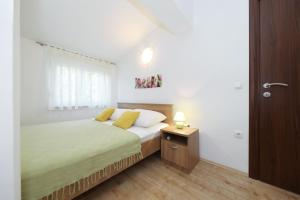 Posteľ alebo postele v izbe v ubytovaní Villa Bobic