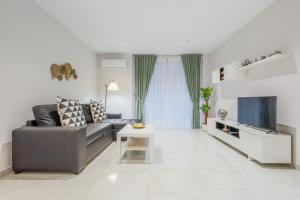 Televízia a/alebo spoločenská miestnosť v ubytovaní EXCLUSIVO APT 2 HAB-2 BAÑOS-LUMINOSO ↑ CALIDADES