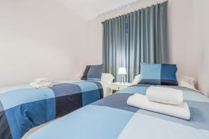 Posteľ alebo postele v izbe v ubytovaní EXCLUSIVO APT 2 HAB-2 BAÑOS-LUMINOSO ↑ CALIDADES