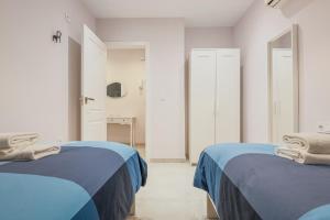 Posteľ alebo postele v izbe v ubytovaní EXCLUSIVO APT 2 HAB-2 BAÑOS-LUMINOSO ↑ CALIDADES