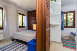 Posteľ alebo postele v izbe v ubytovaní AR-2 CALELLA DE PALAFRUGELL 8 PAX + 30 fotografií