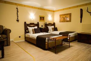 Cama ou camas em um quarto em Villa Westend Hotel an der Messe