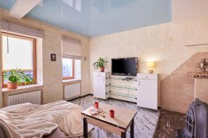 Special flat with great central location tesisinde bir televizyon ve/veya eğlence merkezi