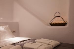Voodi või voodid majutusasutuse Cupola Suites toas