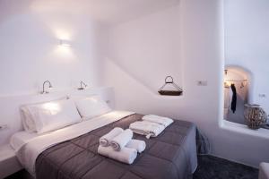 Voodi või voodid majutusasutuse Cupola Suites toas