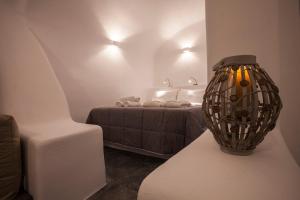 Voodi või voodid majutusasutuse Cupola Suites toas