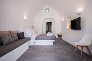 TV a/nebo společenská místnost v ubytování Cupola Suites