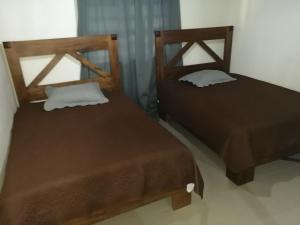 Postel nebo postele na pokoji v ubytování Villa Laura Jarabacoa